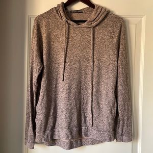 Pink and black sweater. Worn in but still comfy.